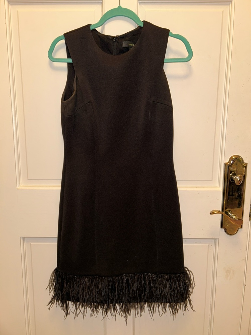 Sleeveless Black Mini Dress with Feather Hem Size 6 maia cocktail dress